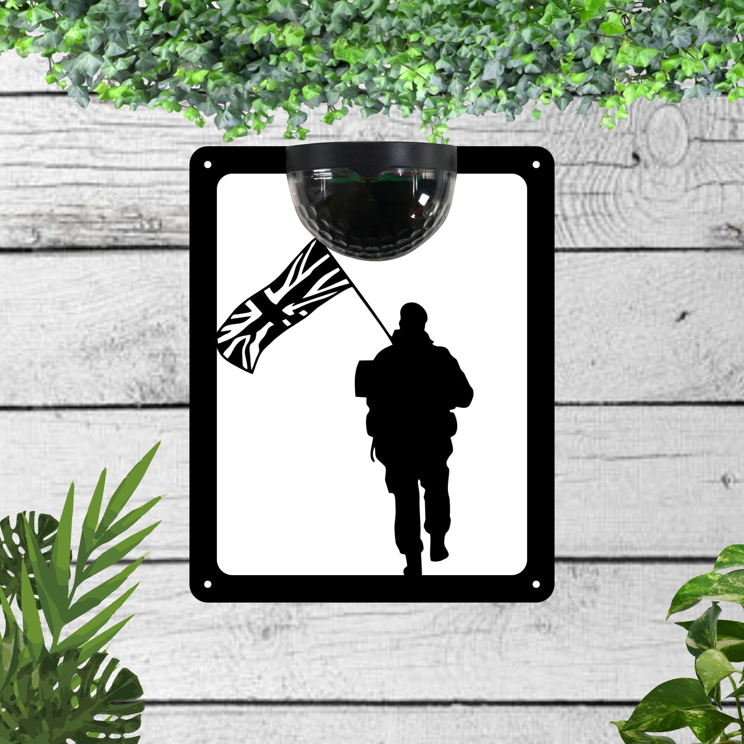 Garden Solar Light Wall Plaque Featuring a Soldier Carrying a Flag | John Alans