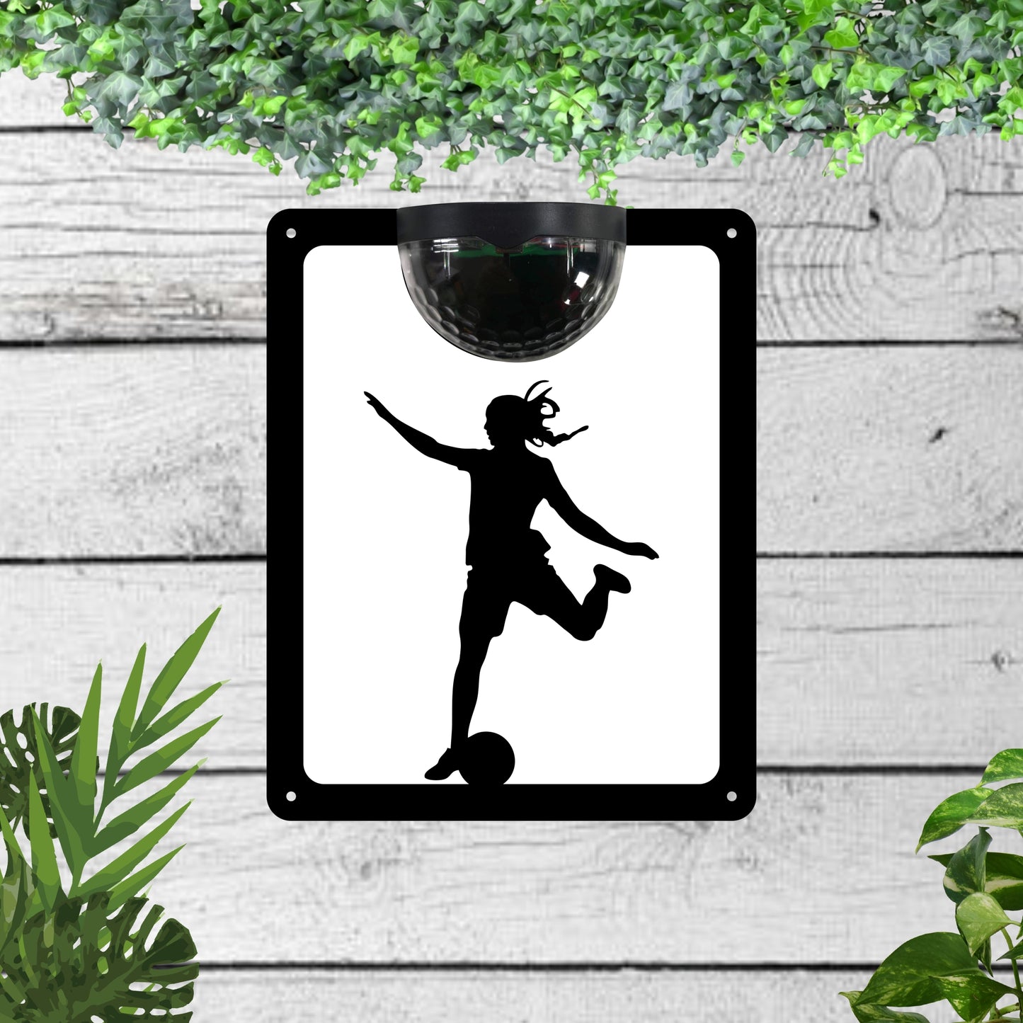 Garden solar wall plaque featuring a Female Football player | John Alans
