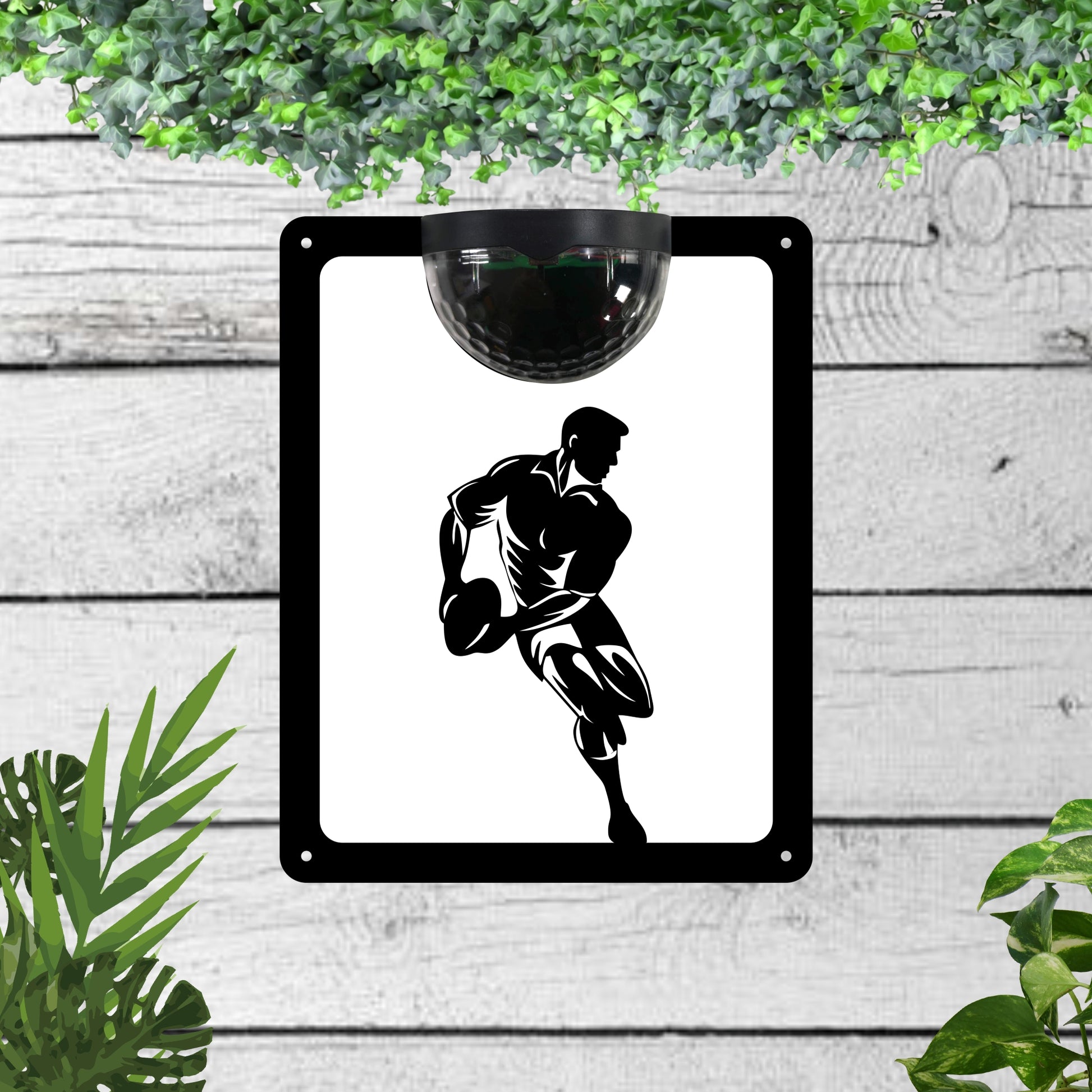 Garden solar wall plaque featuring a rugby player | John Alans