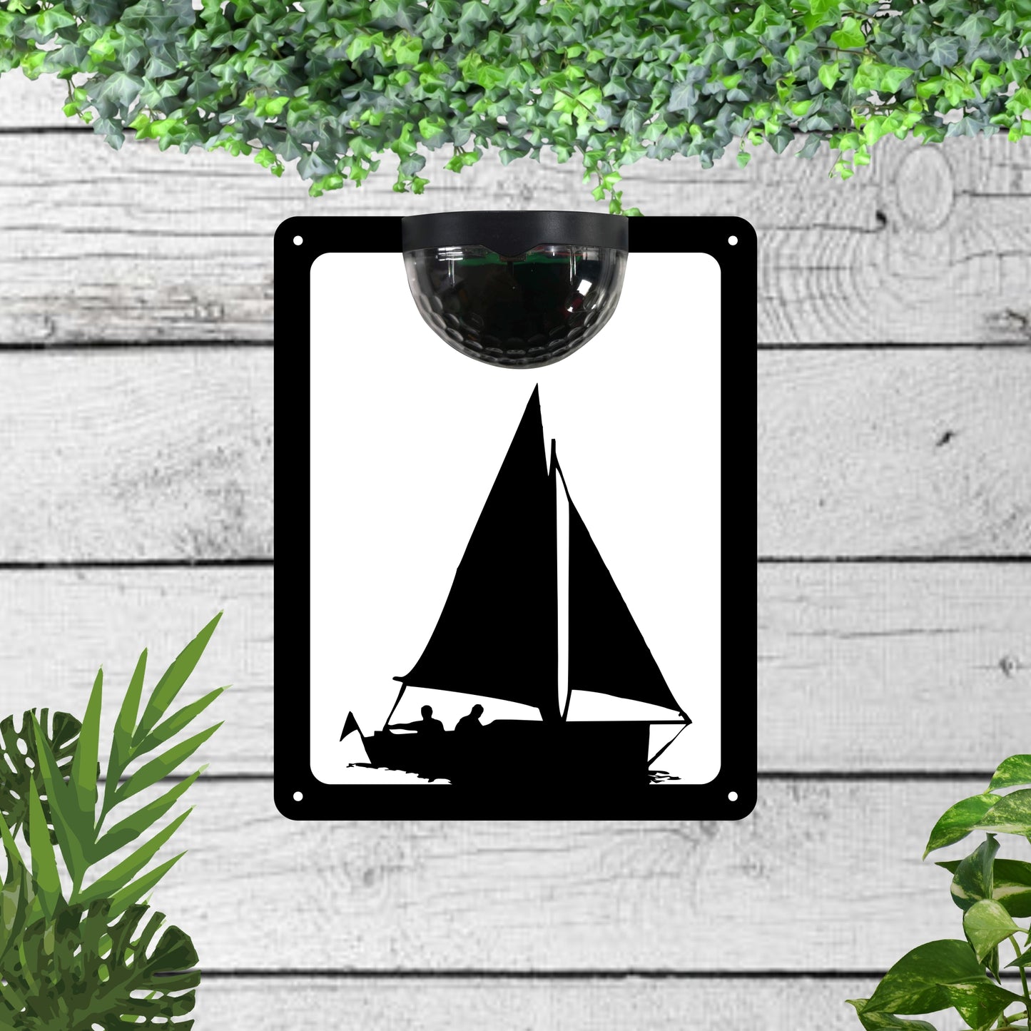 Garden solar wall plaque featuring a sailing boat | John Alans