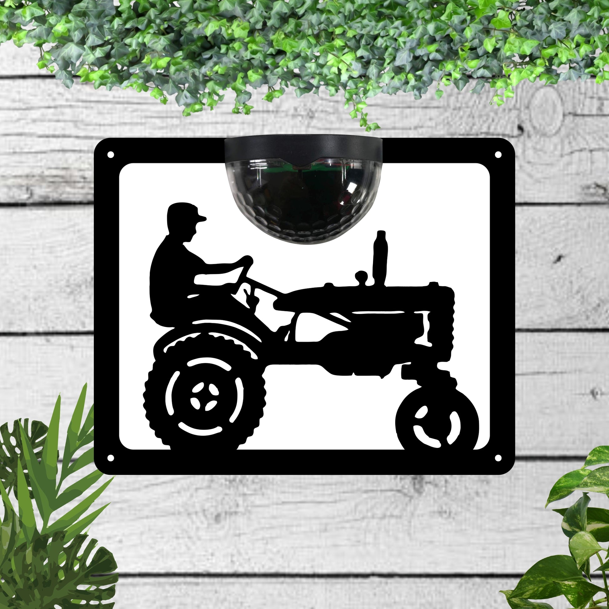 Garden Solar Light Wall Plaque Featuring a Farmer on a Tractor | John Alans